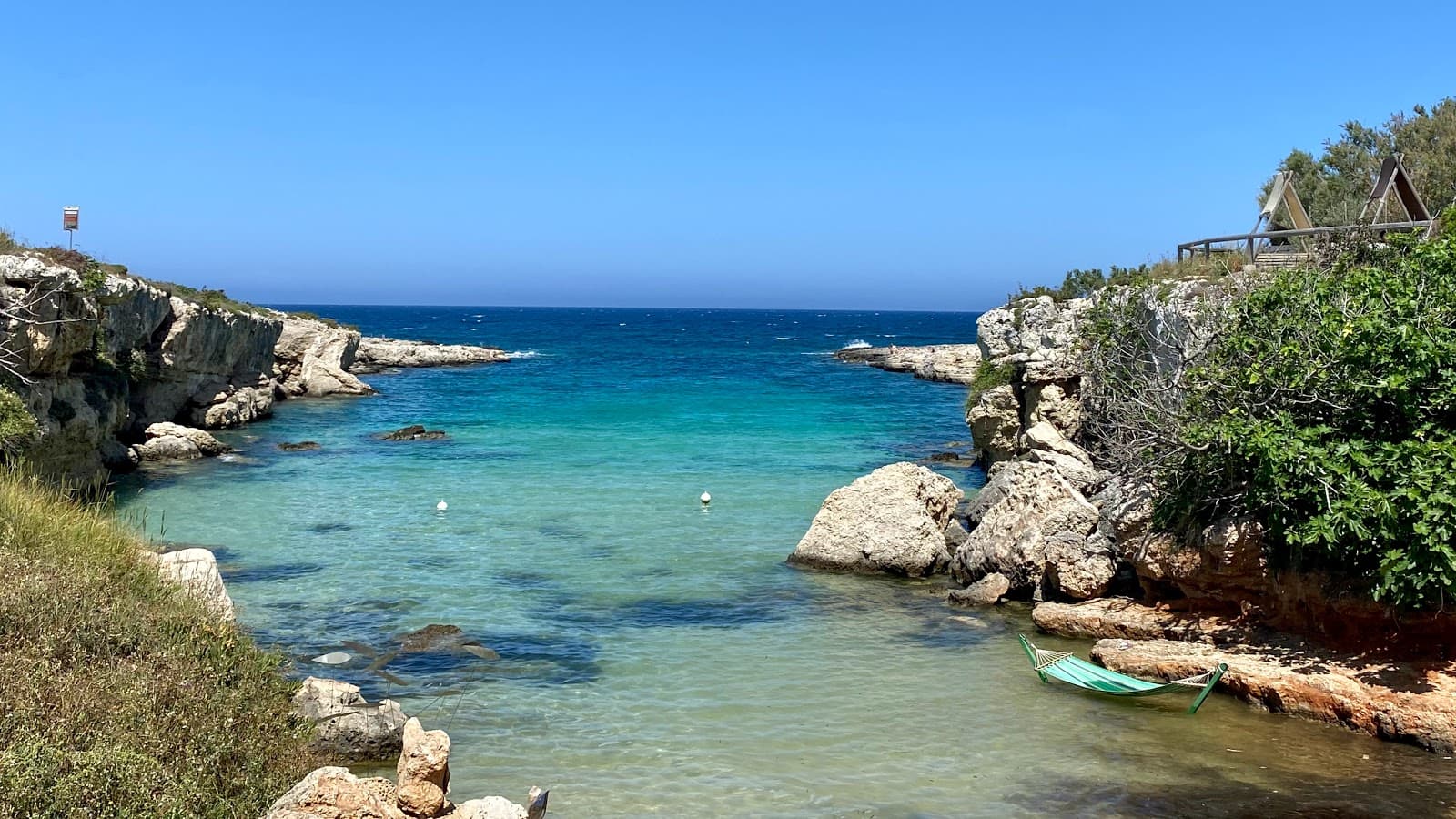 Beach in Monopoli with blue water